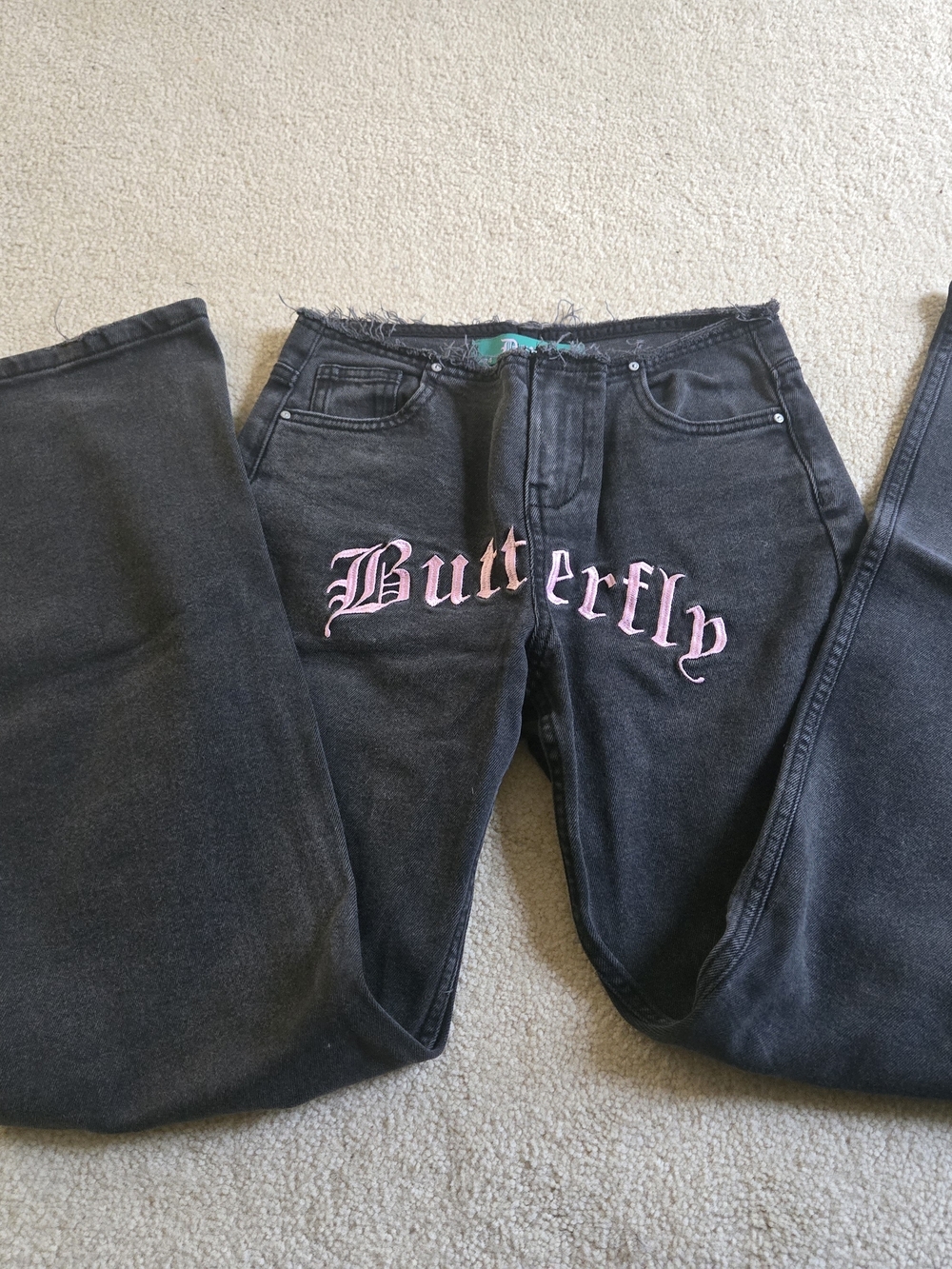 Dolls Kill Black Jeans with Pink 'Butterfly' Script